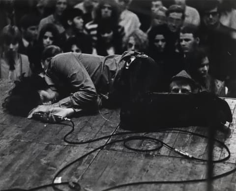 The Doors' Jim Morrison takes a break onstage during a Frankfurt concert in September 1968.