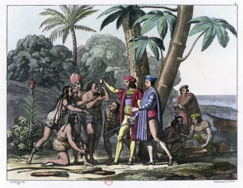 An illustration of Christopher Columbus interacting with Indigenous people.