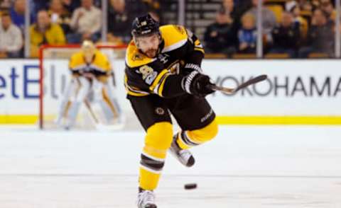 Apr 6, 2017; Boston, MA, USA; Boston Bruins right wing Drew Stafford (19) fires the puck into the zone during the second period against the Ottawa Senators at TD Garden. Mandatory Credit: Winslow Townson-USA TODAY Sports