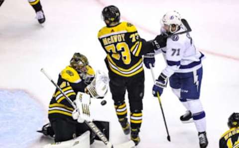 TORONTO, ONTARIO – AUGUST 29: Jaroslav Halak #41 of the Boston Bruins stops a shot as teammate Charlie McAvoy #73 defends Anthony Cirelli #71 of the Tampa Bay Lightning during the second period in Game Four of the Eastern Conference Second Round during the 2020 NHL Stanley Cup Playoffs at Scotiabank Arena on August 29, 2020 in Toronto, Ontario. (Photo by Elsa/Getty Images)