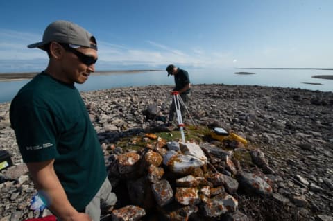 Parks Canada and Inuit archaeologists set up instruments near the HMS Erebus shipwreck.