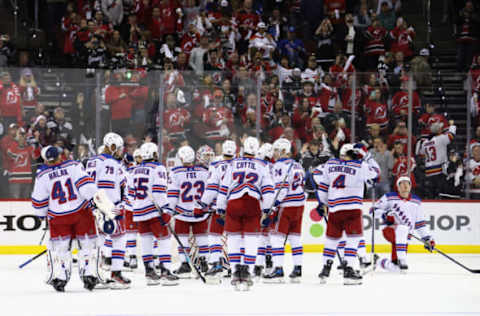 NEWARK, NEW JERSEY – MAY 01: The New York Rangers pause following their 4-0 defeat at the hands of the New Jersey Devils in Game Seven of the First Round of the 2023 Stanley Cup Playoffs at Prudential Center on May 01, 2023, in Newark, New Jersey. (Photo by Bruce Bennett/Getty Images)