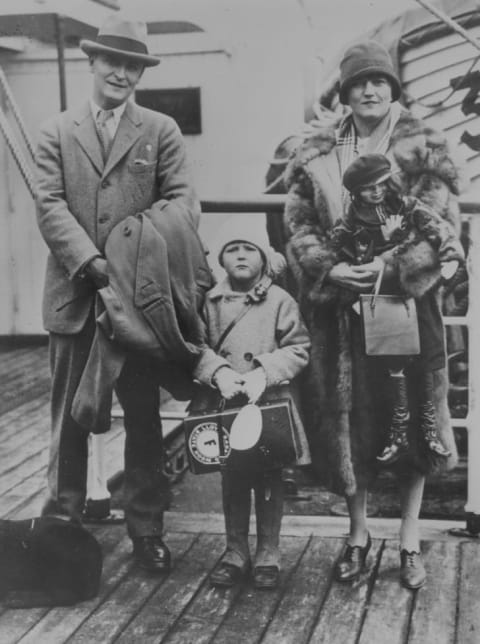 Zelda Fitzgerald with her husband F. Scott Fitzgerald and daughter.