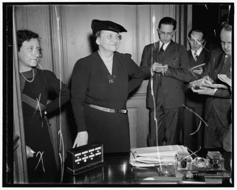 Secretary of Labor Frances Perkins at a press conference.