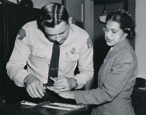 Rosa Parks being fingerprinted after the Montgomery bus boycott.