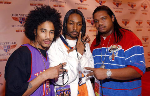 Bone Thugs-n-Harmony attend the Holyfield Foundation Main Event All-Star Weekend benefit concert/party in 2002.