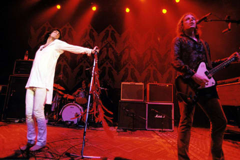 Chris and Rich Robinson of the Black Crowes performing at The Empire in London in 1998.