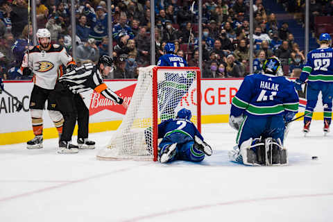 Feb 19, 2022; Vancouver, British Columbia, CAN; Anaheim Ducks forward Adam Henrique (14) celebrates his second goal of the game scored on Vancouver Canucks goalie Jaroslav Halak (41) in the second period at Rogers Arena. Mandatory Credit: Bob Frid-USA TODAY Sports