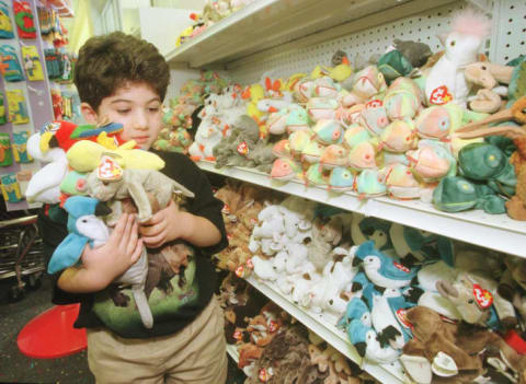 Five-year-old Adam Kalina's arms full of Beanie Babies on a 1999 shopping trip with his mother.