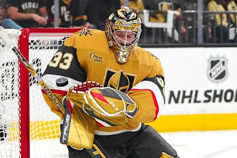 May 12, 2023; Las Vegas, Nevada, USA; Vegas Golden Knights goaltender Adin Hill (33) makes a save against the Edmonton Oilers during the first period of game five of the second round of the 2023 Stanley Cup Playoffs at T-Mobile Arena. Mandatory Credit: Stephen R. Sylvanie-USA TODAY Sports