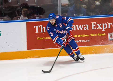 Riley Damiani #13 of the Kitchener Rangers. (Photo by Chris Tanouye/Getty Images)