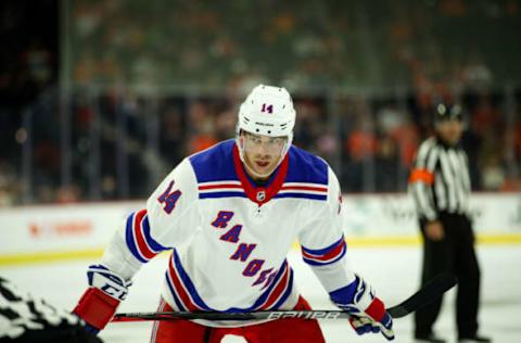 PHILADELPHIA, PA – SEPTEMBER 21: New York Rangers center Greg McKegg (14) gets ready to take a during the NHL Preseason game between the New York Rangers and Philadelphia Flyers on September 21, 2019, at Wells Fargo Center in Philadelphia, PA. (Photo by Nicole Fridling/Icon Sportswire via Getty Images)