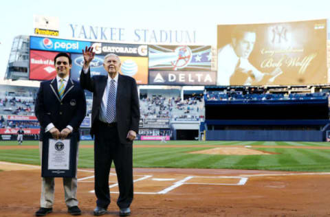 NEW YORK, NY – MAY 01: Legendary broadcaster Bob Wolff is honored by the Guiness Book of World Records for having the longest career as a sportscasster with 74 years 6 months and 8 days before the game between the New York Yankees and the Seattle Mariners on May 1, 2014 at Yankee Stadium in the Bronx borough of New York City.Yankees manager Joe Girardi