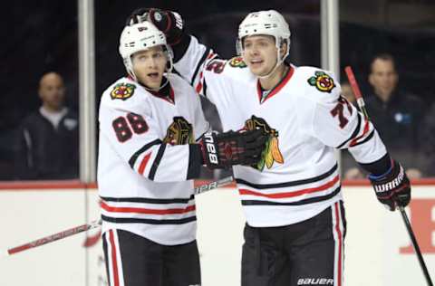 Dec 15, 2016; Brooklyn, NY, USA; Chicago Blackhawks left wing Artemi Panarin (72) celebrates his goal against the New York Islanders with Chicago Blackhawks right wing Patrick Kane (88) during the first period at Barclays Center. Mandatory Credit: Brad Penner-USA TODAY Sports