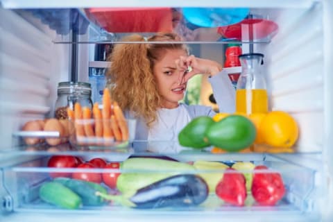 Maintaining an orderly fridge will help you spot spoiling food before it starts to stink.