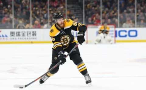 BOSTON, MASSACHUSETTS – JANUARY 10: Kevan Miller #86 of the Boston Bruins takes a shot against the Washington Capitals during the first period at TD Garden on January 10, 2019 in Boston, Massachusetts. (Photo by Maddie Meyer/Getty Images)