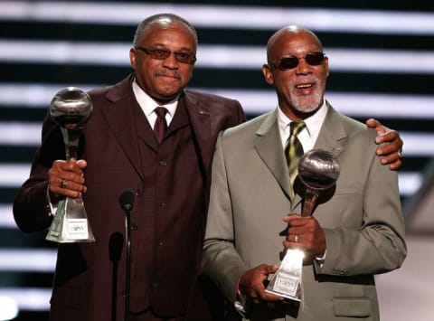 Tommie Smith and John Carlos accept the Arthur Ashe Award for Courage at the 2008 ESPY Awards in Los Angeles, California.