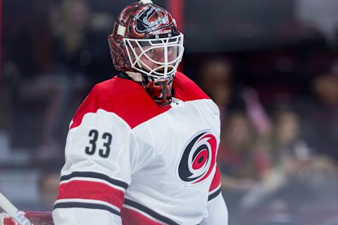 OTTAWA, ON – MARCH 24: Carolina Hurricanes Goalie Scott Darling (33) waits for shots during warm-up before National Hockey League action between the Carolina Hurricanes and Ottawa Senators on March 24, 2018, at Canadian Tire Centre in Ottawa, ON, Canada. (Photo by Richard A. Whittaker/Icon Sportswire via Getty Images)