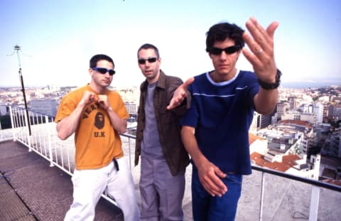 L to R: Beastie Boys Ad-Rock (Adam Horowitz), MCA (Adam Yauch), and Mike D (Michael Diamond) pose in Portugal 1998.