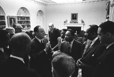 Hubert Humphrey speaks with civil rights leaders including John Lewis, Martin Luther King, Jr., Clarence Mitchell, Roy Wilkins, Floyd McKissick, and Dorothy Height in 1966.