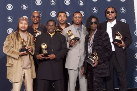 Baha Men celebrate backstage at the 2001 Grammys after winning Best Dance Recording for "Who Let the Dogs Out."