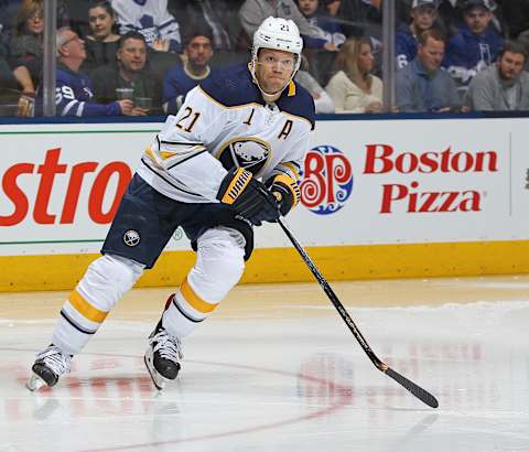 TORONTO, ON – APRIL 2: Kyle Okposo #21 of the Buffalo Sabres skates against the Toronto Maple Leafs during an NHL game at the Air Canada Centre on April 2, 2018 in Toronto, Ontario, Canada. The Maple Leafs defeated the Sabres 5-2. (Photo by Claus Andersen/Getty Images) *** Local Caption *** Kyle Okposo