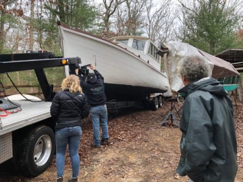 Project team members for the Orca III inspect the Lydia.