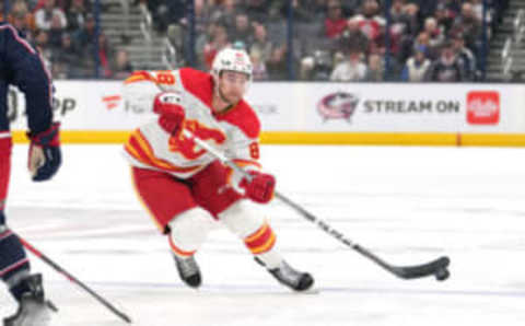 COLUMBUS, OHIO – OCTOBER 20: Andrew Mangiapane #88 of the Calgary Flames skates with the puck during the first period against the Columbus Blue Jackets at Nationwide Arena on October 20, 2023 in Columbus, Ohio. (Photo by Jason Mowry/Getty Images)