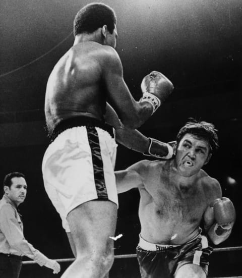 Muhammad Ali and Jerry Quarry exchange punches. Elsewhere in Atlanta, armed gunmen were getting ready for a surprise party.