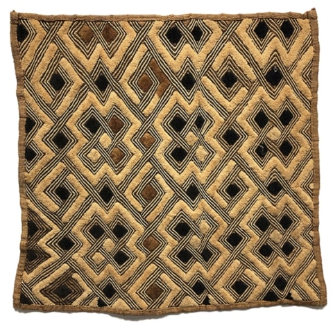 The cloth features a repeating pattern with many variations.