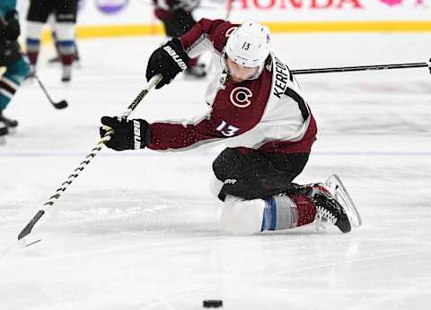 SAN JOSE, CA – MAY 08: Alexander Kerfoot #13 of the Colorado Avalanche falls to the ice attempting to gain control of the puck against the San Jose Sharks during the first period of Game Seven of the Western Conference Second Round during the 2019 NHL Stanley Cup Playoffs at SAP Center on May 8, 2019 in San Jose, California. The Sharks won the game 3-2. (Photo by Thearon W. Henderson/Getty Images)