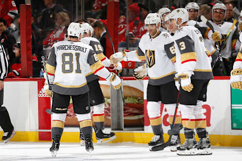 NEWARK, NJ – DECEMBER 3: The Vegas Golden Knights congratulate Jonathan Marchessault #81 on scoring a natural hat trick during the game against the New Jersey Devils at the Prudential Center on December 3, 2019 in Newark, New Jersey. The Knights defeated the Devils 4-3. (Photo by Andy Marlin/NHLI via Getty Images)