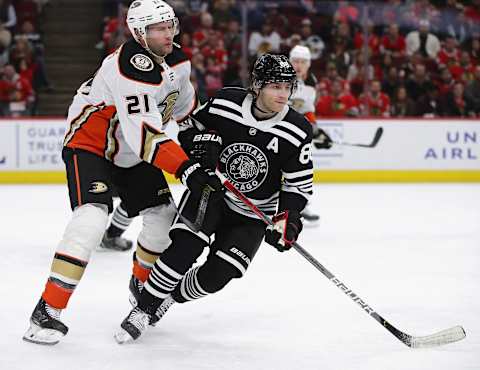 Patrick Kane #88 of the Chicago Blackhawks skates to the puck under pressure from David Backes #21 of the Anaheim Ducks (Photo by Jonathan Daniel/Getty Images)