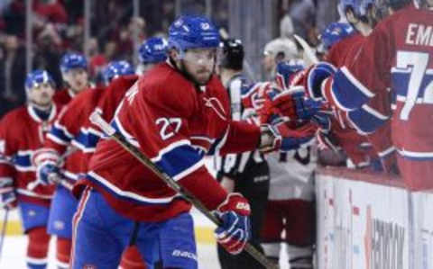 Jan 26, 2016; Montreal, Quebec, CAN; Montreal Canadiens forward Alex Galchenyuk (27) celebrates with teammates after scoring a goal against the Columbus Blue Jackets during the third period at the Bell Centre. Mandatory Credit: Eric Bolte-USA TODAY Sports