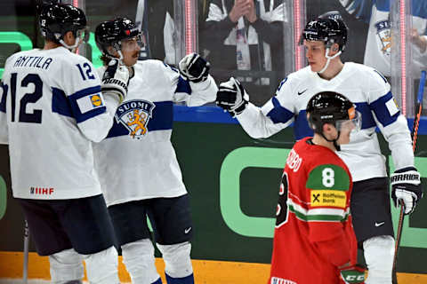 Finland’s forward Marko Anttila (L), Finland’s forward Hannes Bjorninen and Finland’s forward Waltteri Merela celebrate Finland’s sixth goal during the IIHF Ice Hockey Men’s World Championships Preliminary Round – Group A match between Hungary and Finland in Tampere, Finland, on May 19, 2023. (Photo by Vesa Moilanen / Lehtikuva / AFP) / Finland OUT (Photo by VESA MOILANEN/Lehtikuva/AFP via Getty Images)