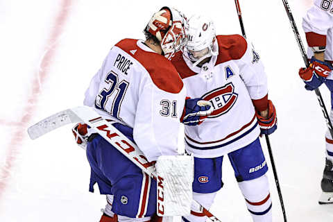 Carey Price #31 and Paul Byron #41 of the Montreal Canadiens (Photo by Elsa/Getty Images)