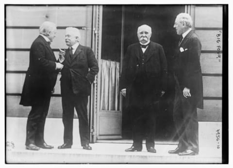 The "Big Four" leaders at the Paris Peace Conference in May 1919. From left to right: Britain's David Lloyd George, Italy's Vittorio Orlando, France's Georges Clemenceau, and Woodrow Wilson.