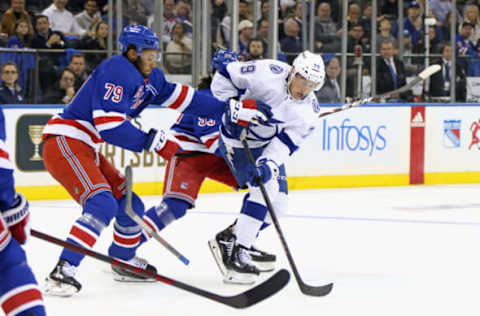 NEW YORK, NEW YORK – OCTOBER 11: K’Andre Miller #79 of the New York Rangers defends Ross Colton #79 of the Tampa Bay Lightning during the first period at Madison Square Garden during the season-opening game on October 11, 2022, in New York City. (Photo by Bruce Bennett/Getty Images)