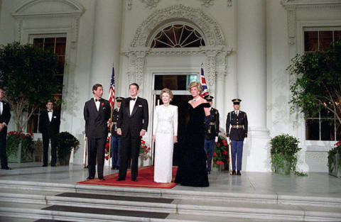 Prince Charles, President Ronald Reagan, Nancy Reagan, and Princess Diana pose for photos before a dinner in 1985.