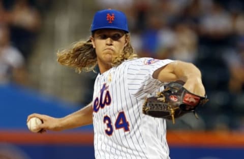 Sep 2, 2016; New York City, NY, USA; New York Mets starting pitcher Noah Syndergaard (34) delivers a pitch in the first inning against the Washington Nationals at Citi Field. Mandatory Credit: Noah K. Murray-USA TODAY Sports