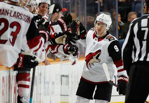 NASHVILLE, TN – NOVEMBER 29: Clayton Keller #9 of the Arizona Coyotes celebrates his goal along the bench against the Nashville Predators at Bridgestone Arena on November 29, 2018 in Nashville, Tennessee. (Photo by John Russell/NHLI via Getty Images)