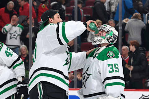 CHICAGO, IL – FEBRUARY 24: Goalies Ben Bishop #30 and Anton Khudobin #35 of the Dallas Stars celebrate after defeating the Chicago Blackhawks 4-3 at the United Center on February 24, 2019 in Chicago, Illinois. (Photo by Bill Smith/NHLI via Getty Images)