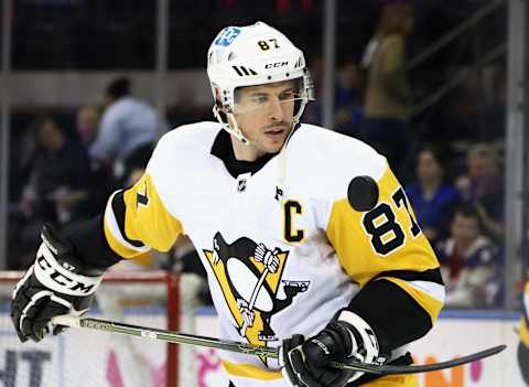 NEW YORK, NEW YORK – MAY 11: Sidney Crosby #87 of the Pittsburgh Penguins plays with the puck during warm-ups prior to playing against the New York Rangers in Game Five of the First Round of the 2022 Stanley Cup Playoffs at Madison Square Garden on May 11, 2022 in New York City. (Photo by Bruce Bennett/Getty Images)