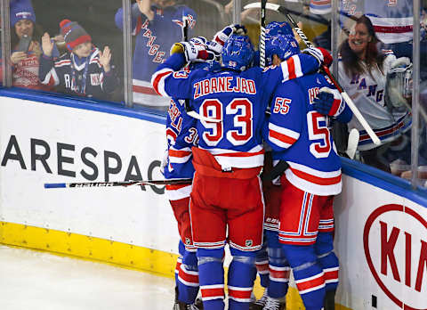 NEW YORK, NY – FEBRUARY 09: The New York Rangers celebrate after New York Rangers Center Mika Zibanejad (93) scores the go-ahead goal during the third period of the National Hockey League game between the Calgary Flames and the New York Rangers on February 9, 2018 at Madison Square Garden in New York, NY. (Photo by Joshua Sarner/Icon Sportswire via Getty Images)