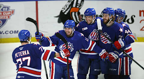 Amerks Lukas Rousek celebrates his goal against Utica.