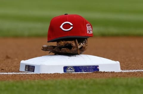 Jul 24, 2015; Denver, CO, USA; A Cincinnati Reds hat on top of third base in the first inning against the Colorado Rockies at Coors Field. Mandatory Credit: Isaiah J. Downing-USA TODAY Sports