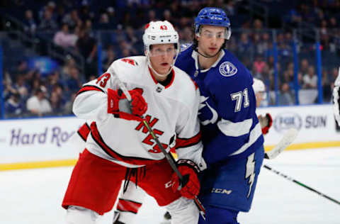 TAMPA, FL – SEPTEMBER 17: Carolina Hurricanes center Eetu Luostarinen (43) and Tampa Bay Lightning center Anthony Cirelli (71) skate during the NHL Preseason game between the Carolina Hurricanes and Tampa Bay Lightning on September 17, 2019 at Amalie Arena in Tampa, FL. (Photo by Mark LoMoglio/Icon Sportswire via Getty Images)