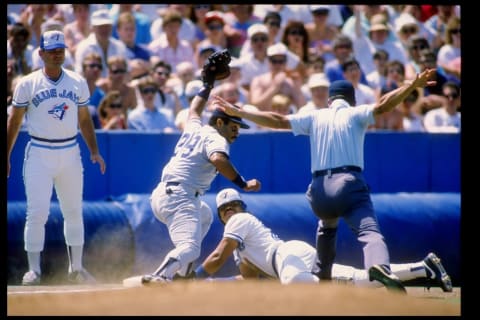 1988: Jesse Barfield of the Toronto Blue Jays slides into a base for a triple during a game. Mandatory Credit: Rick Stewart /Allsport