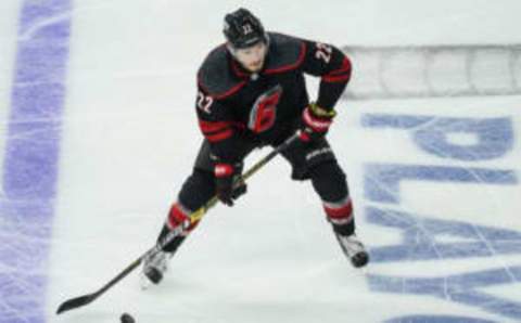 RALEIGH, NC – APRIL 18: Carolina Hurricanes defenseman Brett Pesce (22) controls a puck in the zone during a game between the Carolina Hurricanes and the Washington Capitals on April 18, 2019, at the PNC Arena in Raleigh, NC. (Photo by Greg Thompson/Icon Sportswire via Getty Images)