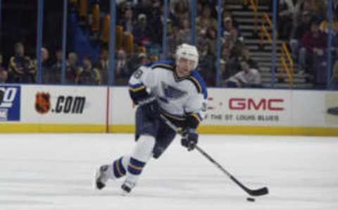 ST. LOUIS – FEBRUARY 6: Pavol Demitra #38 of the St. Louis Blues skates with the puck against the New York Rangers on February 6, 2003 at the Savvis Center in St. Louis, Missouri. The Blues and the Rangers tied 4-4. (Photo by Elsa/Getty Images/NHLI)